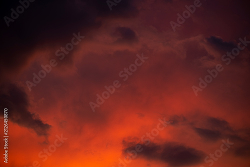 Canvastavla Dark red moody clouds at ominous sunset