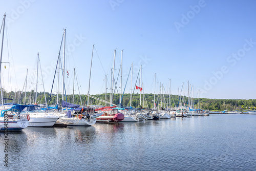 Картината върху платно Marina with Sailboats on Lake Huron in Summer, Canada