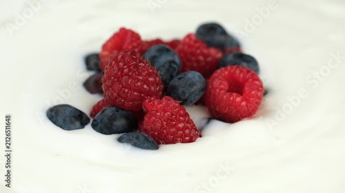 Healthy protein breakfast Yogurt with fresh berries close up, rotate