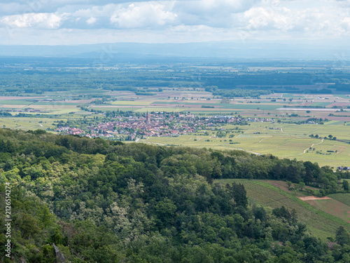 Foto Scenic high angle view over Alsatian plain and village from a forested mountain