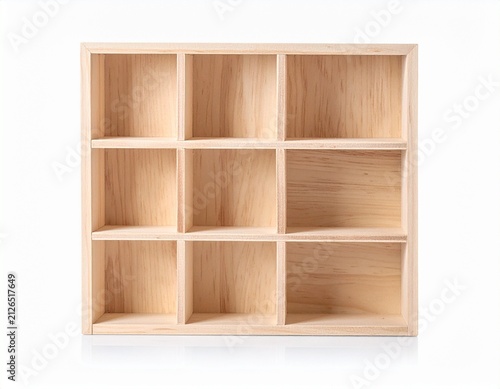 Light wood cube shelving unit with nine compartments, isolated
