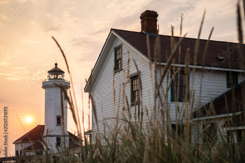 Peaceful Oregon lighthouse with keeper's quarters in the morning light