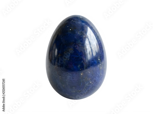 A polished egg shaped sculpture carved from deep blue lapis lazuli stone featuring small golden flecks isolated against a solid black background