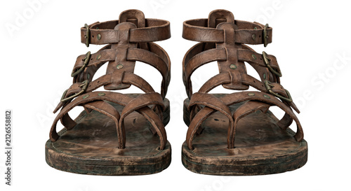 Foto Pair of ancient brown leather gladiator sandals front view