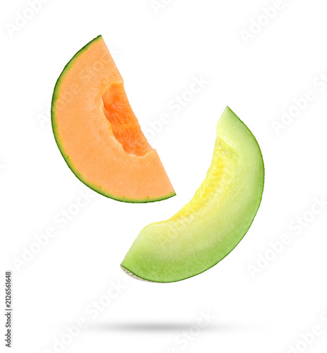 Slices of cantaloupe melon falling in the air isolated on transparent background. PNG