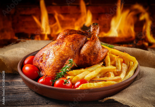 Pollo asado con patatas fritas