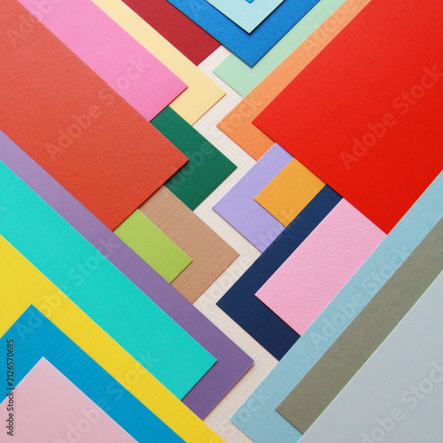 Fotografía Vibrant overlapping colorful paper sheets create a dynamic geometric composition