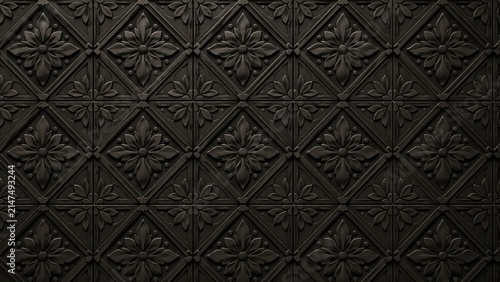 Dark embossed geometric tile texture with intricate floral relief pattern