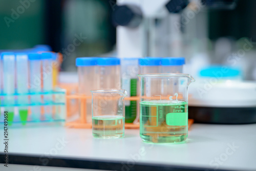 Obraz na płótnie Chemical Solutions in Beakers for Research and Experimental Purposes