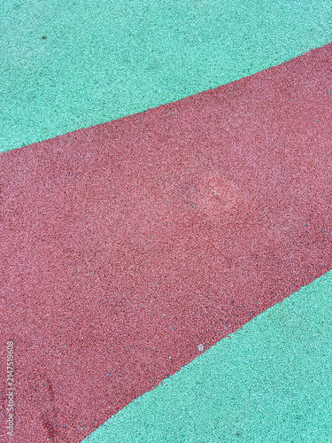 Colorful playground surface with red and green areas