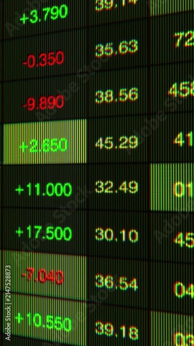 Dynamic Financial Data Display with Numerical Values Representing Stock Markets, Highlighting Gains and Losses in Green and Red Colors against a Pixelated Dark Background