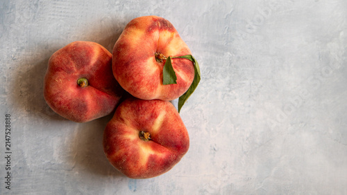 Fresh satellite peaches overhead background
