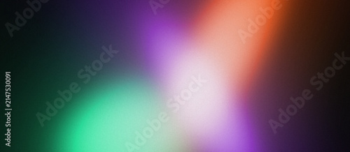 Beautiful abstract gradient noise background. Colorful blurred light leaks of green, purple, and orange on a dark backdrop. Modern grainy wallpaper template for web design header and UI projects.