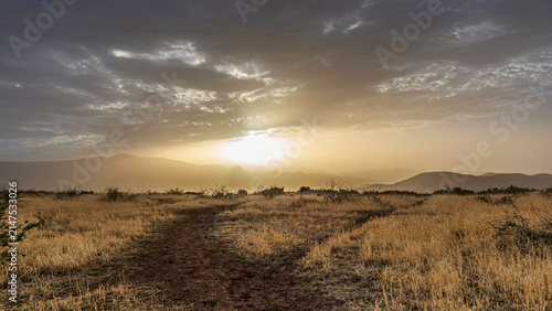Foto Dramatic Dust Storm Sunset at Sunset Point Scenic Overlook, Arizona