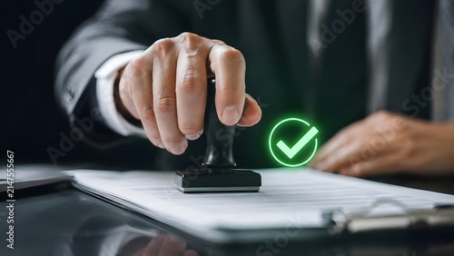 Business certification concept with corporate executive stamping document and glowing green checkmark hologram for official legal approval