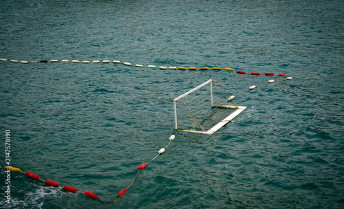 Fotografie Water polo goal floating in the sea surrounded by safety lane markers