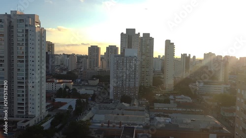 Sunset between buildings in the Lapa neighborhood of Sao Paulo.