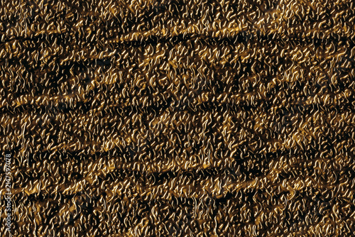 Gold Foil texture background. Retro golden shiny wall surface.