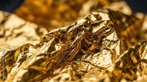 Golden Foil Texture with Crumpled Details and Light Reflection
