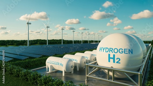 White Hydrogen Fuel Tanks Stored Near Solar Panels and Wind Turbines Generating Clean Renewable Energy Future