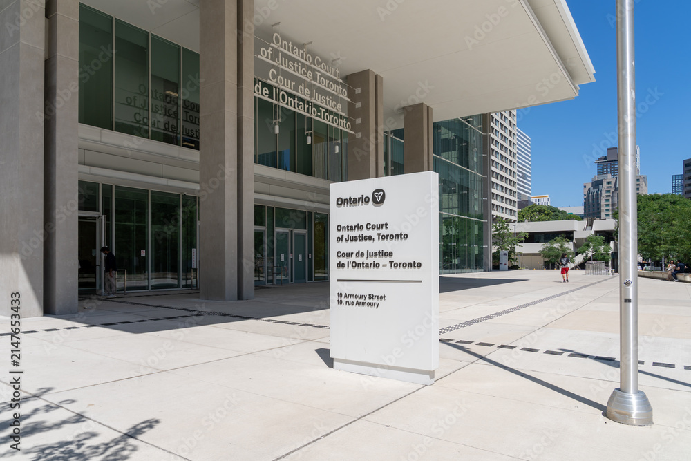 Fototapeta premiumToronto, Ontario, Canada - August 5, 2026: Ontario Court of Justice building located on Armoury Street in Toronto, Canada. The Ontario Court of Justice is the provincial court of record. 