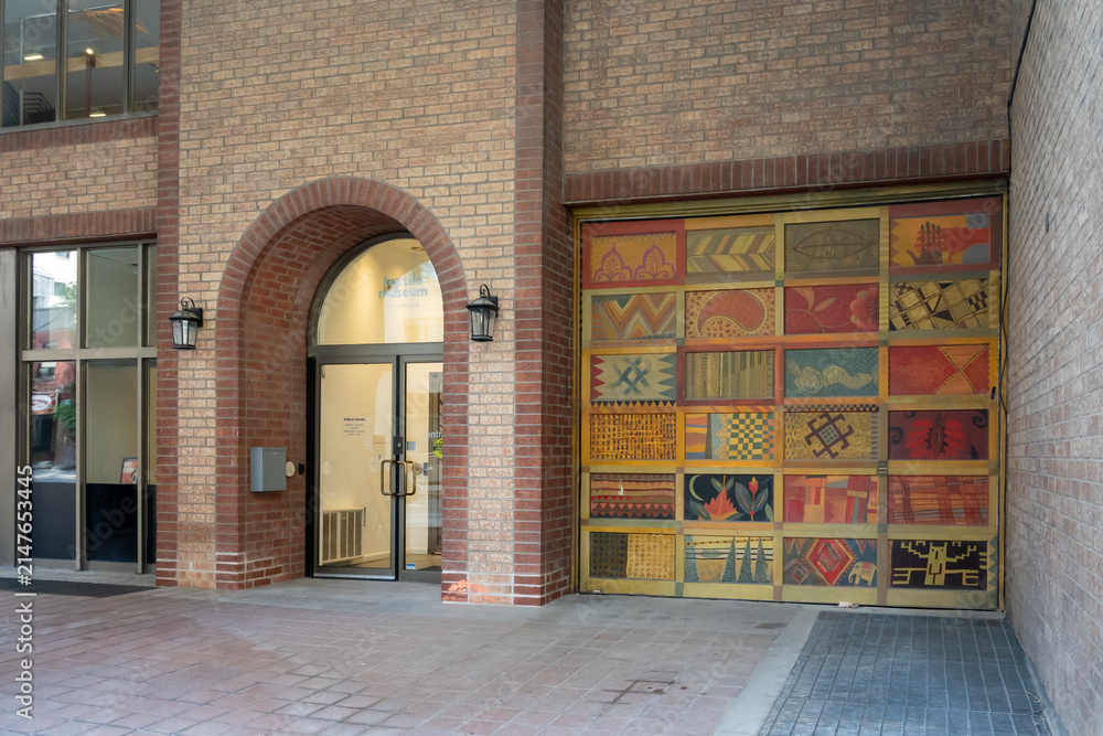 Fototapeta premiumToronto, Canada - August 5, 2026: The entrance to the Textile Museum of Canada on Centre Ave in Toronto, Ontario, Canada. 