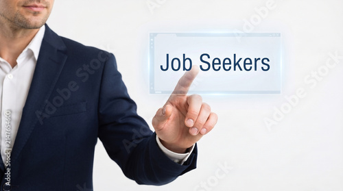 Photo, close-up, hand pointing at a virtual screen displaying the text “job seekers,” company employees, businesspeople, white background  