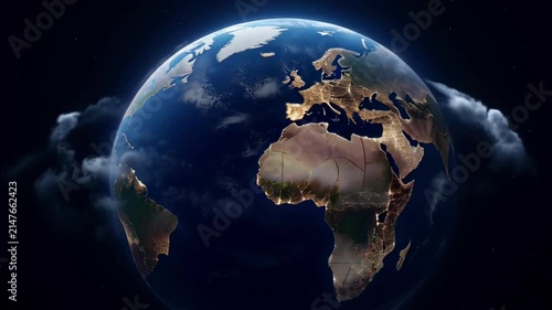 Earth spinning globe in dark space with cloud around Africa Europe and America, repeat view of planet for environmental climate and science concept, glowing continent world space scene