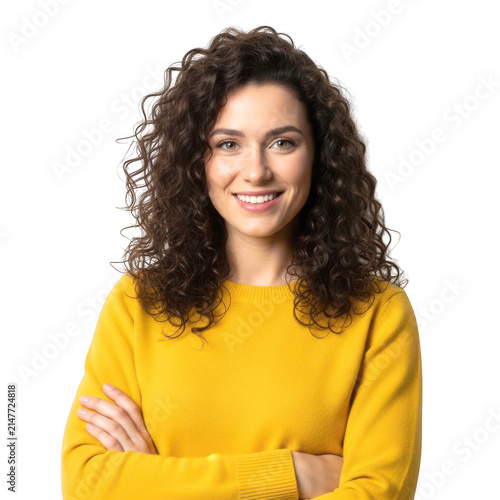 Woman with curly hair wearing a yellow sweater
