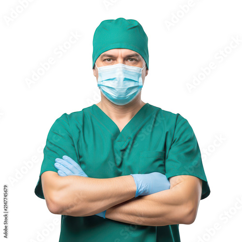 Confident male doctor in surgical scrubs with crossed arms