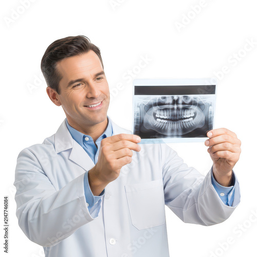 Doctor holding a dental x-ray image with a confident smile