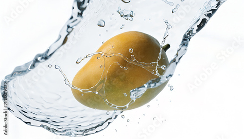 Water Splash Swirling Around Ripe Golden Mango on Pure White Background