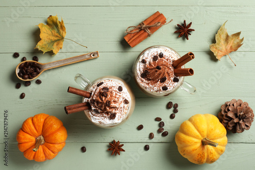 Mugs of pumpkin latte with ...