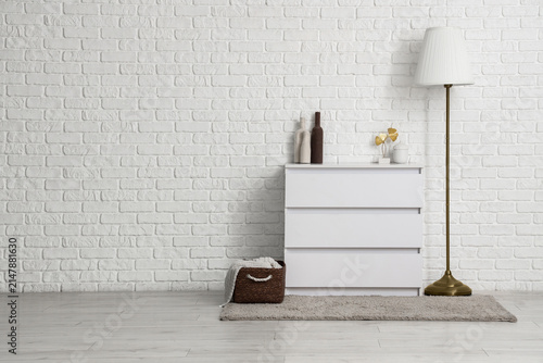 Chest of drawers with decor...