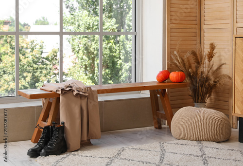 Wooden bench with pumpkins ...