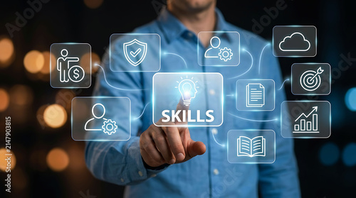 Businessman touching virtual skills icon with business development symbols