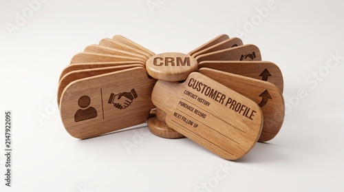 Wooden rolodex organizer with CRM and customer profile text, representing customer relationship management concept in sales and business development, studio shot on white background