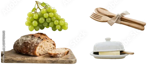 Obraz  z motywem A collection of reusable cutlery and picnic-style food items including grapes, bread, and a butter dish.