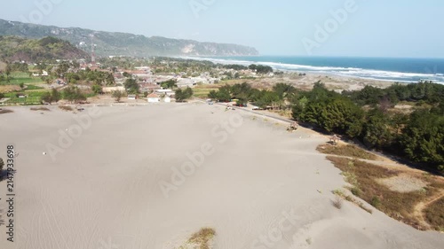 Aerial View of Gumuk Pasir Parangkusumo, Coastal Village and Parangtritis Beach in Yogyakarta, Indonesia