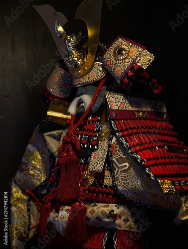 Konstfotografi The Majestic Golden Dragon Crest and Intricate Red Cordage of a Traditional Japa