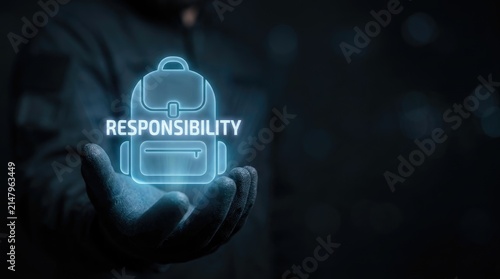 Person holding glowing digital backpack icon representing personal responsibility concept in dark environment