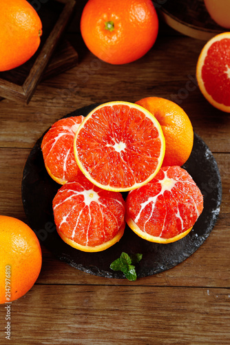 Fresh Red Blood Oranges from Gannan Jiangxi China on Wooden Table