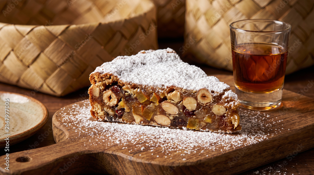 Fototapeta premium Italian Panforte di Siena Fruit Nut Cake with Vin Santo