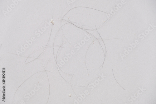 Obraz na plátně Fallen hair and dandruff on the floor