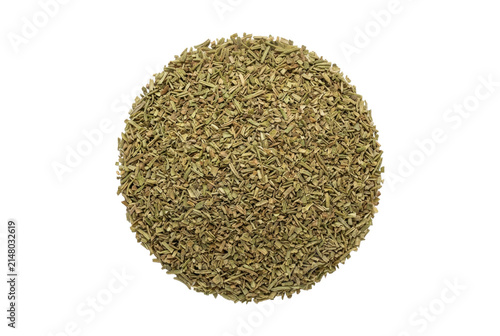 Dried rosemary leaves arranged in a circle on black background