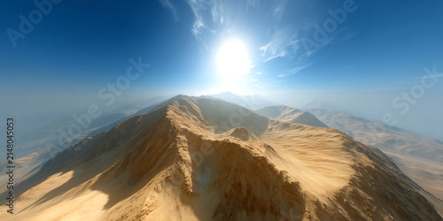 Aerial View of a Vast Golden Desert Mountain Range Under a Bright Sun
