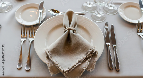 Elegant table setting with folded napkin, blank spaces for text mockup, blank spaces for text