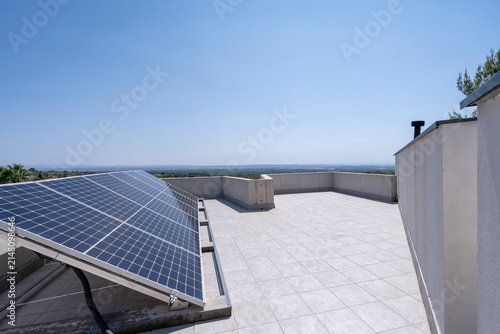 Solar panels on the roof of a modern house