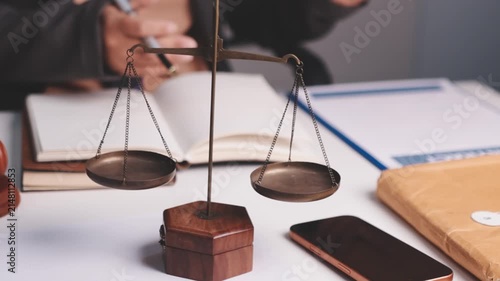 Businesswoman and Male lawyer or judge consult and conference having team meeting with client at law firm in office, Law and Legal services concept