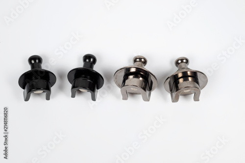 Strap locks for securely attaching a strap to an electric guitar.